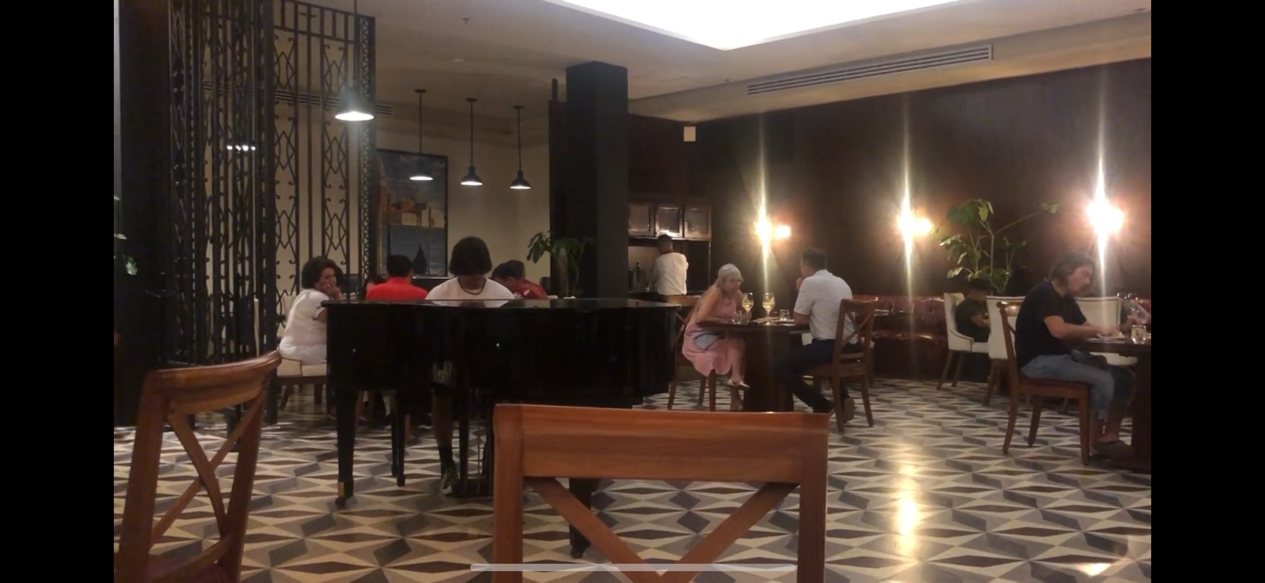 Liam performing at a restaurant